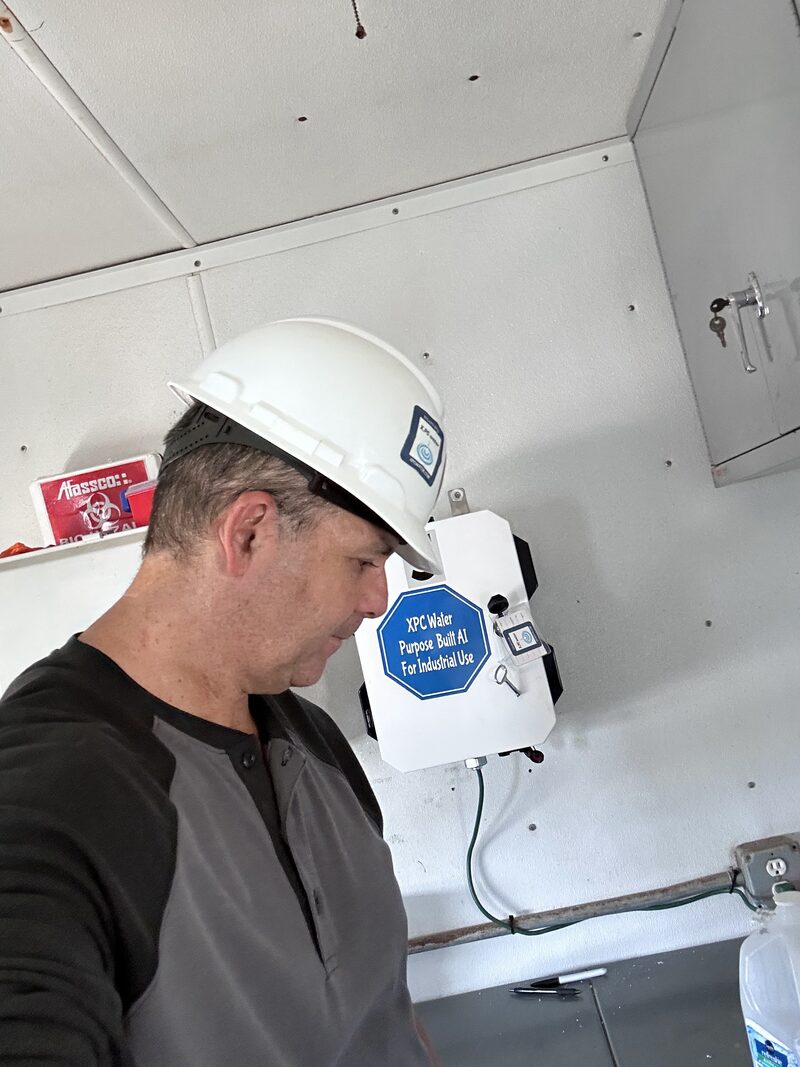 An XPC AIBox edge unit installed at a treatment site.